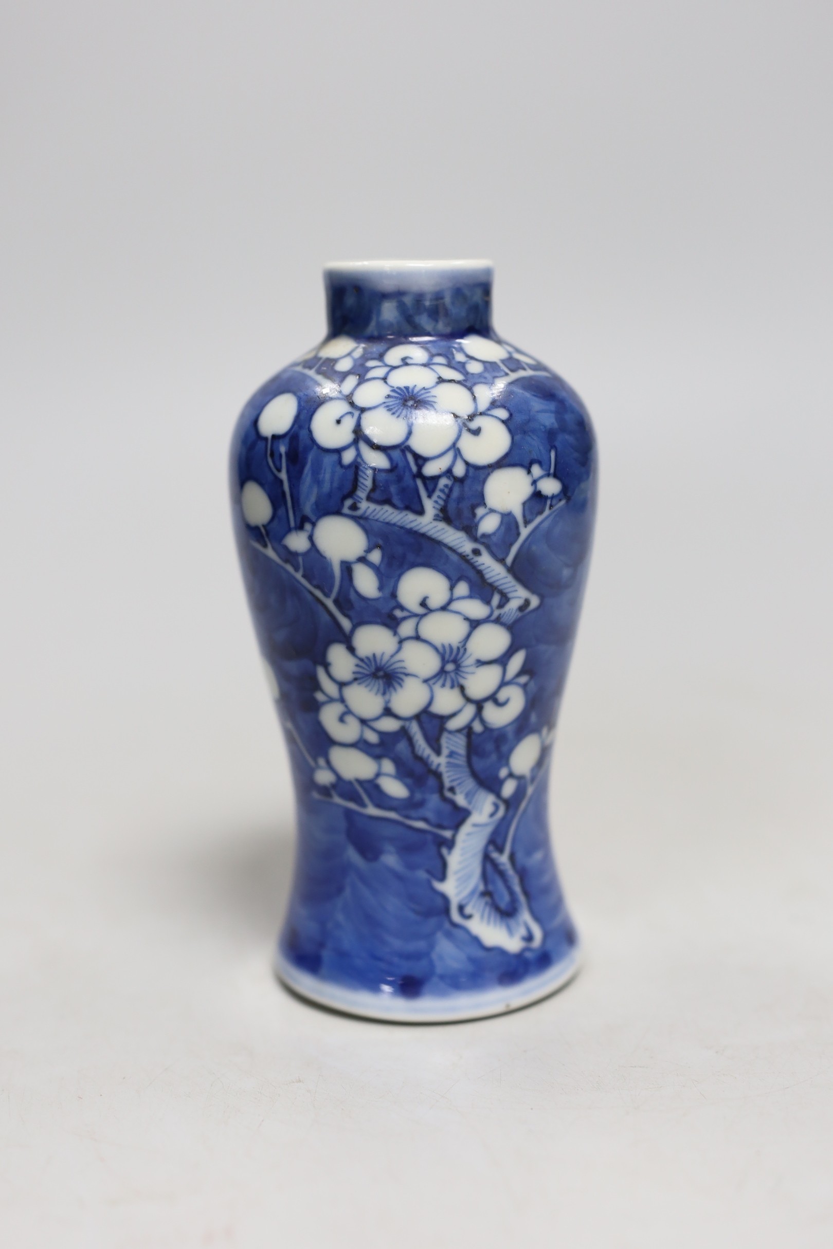 A small 19th century Chinese blue and white prunus vase. 13.5cm tall